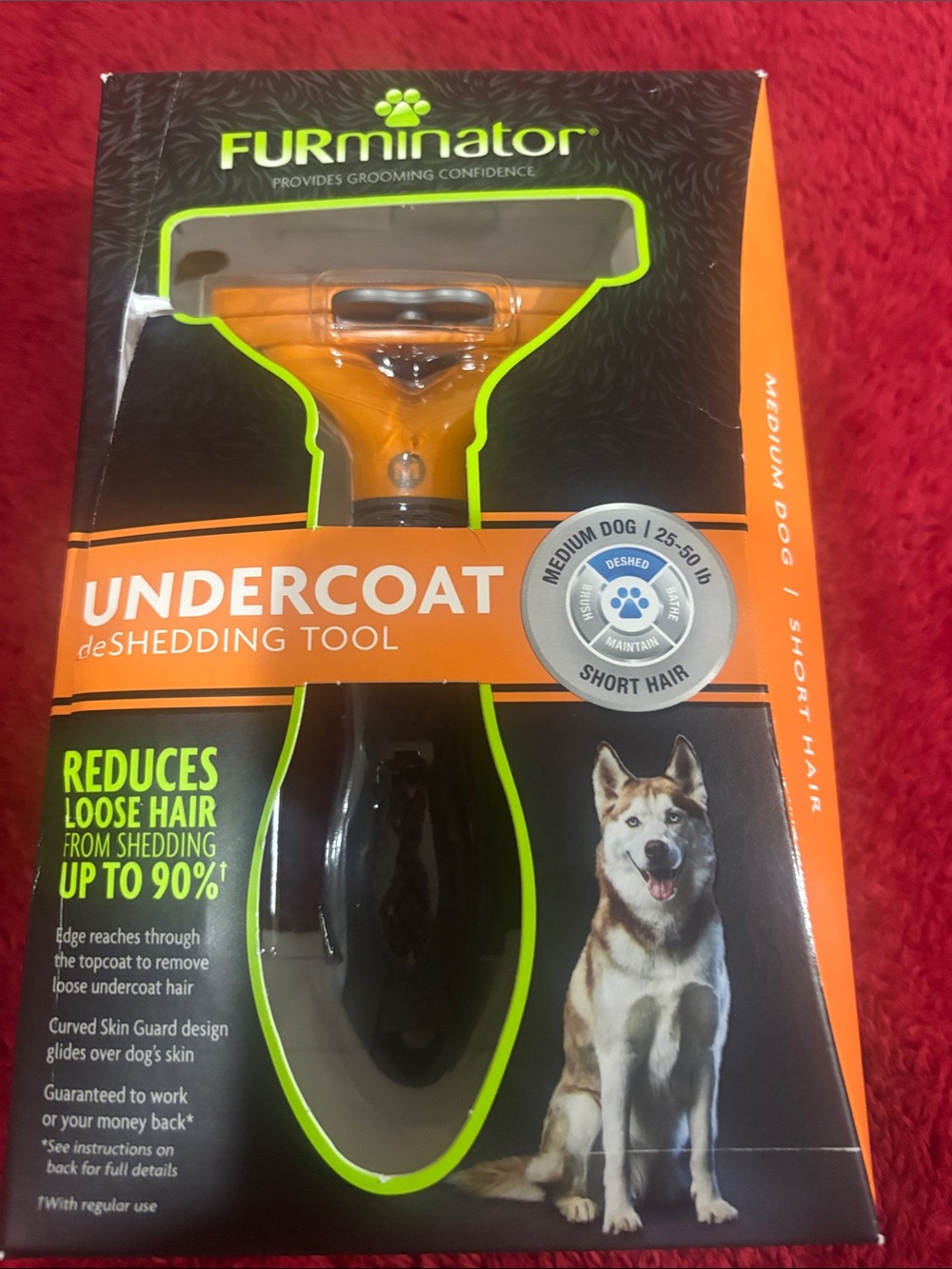 FURminator Orange and Black Undercoat deShedding Tool for Dogs medium dog